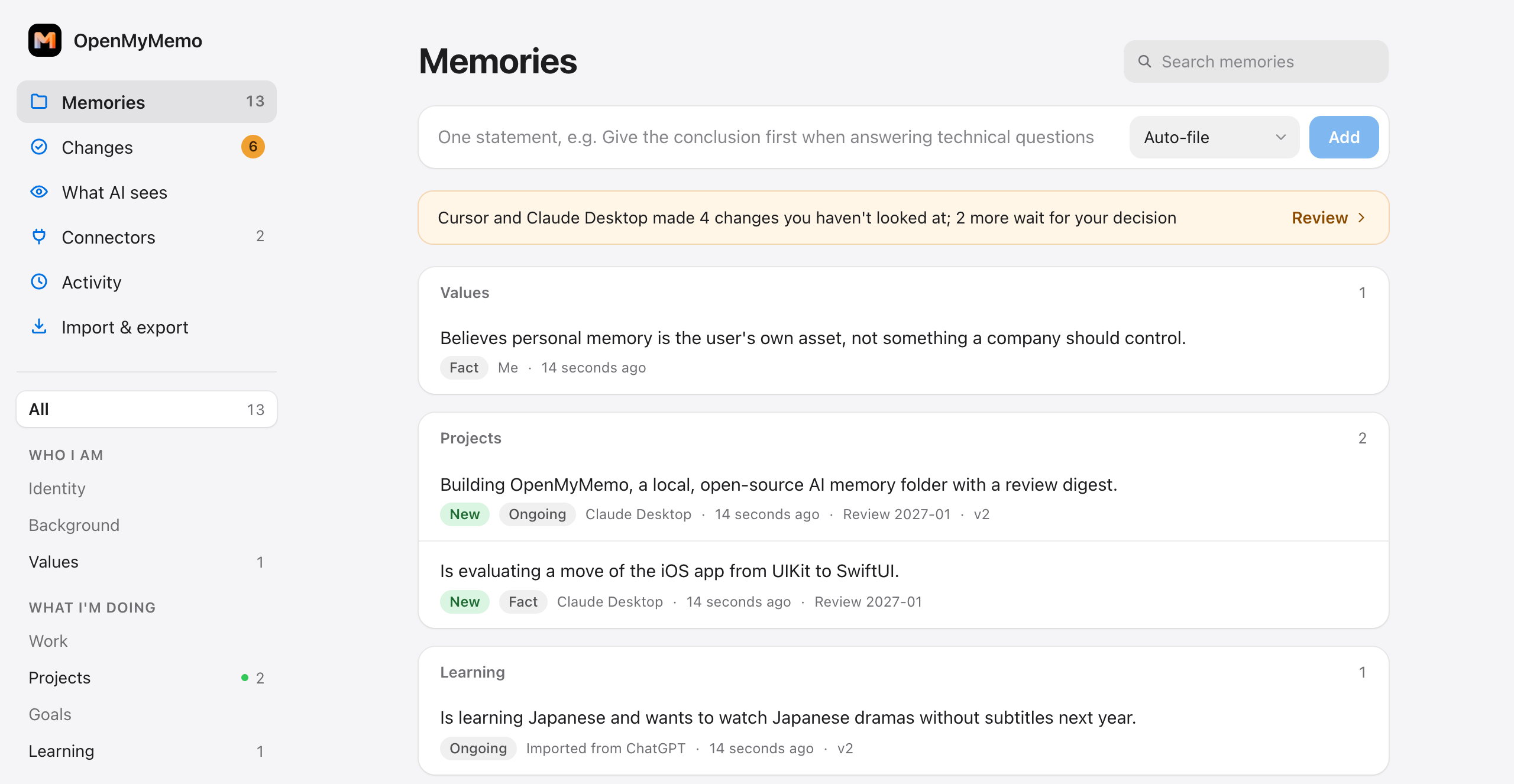 The OpenMyMemo panel: memories grouped by topic, each showing which app it came from, and a note that Cursor and Claude Desktop made changes to review